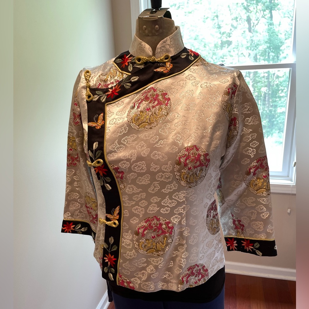 Silver Asian blouse with black embroidered trim and frog closures